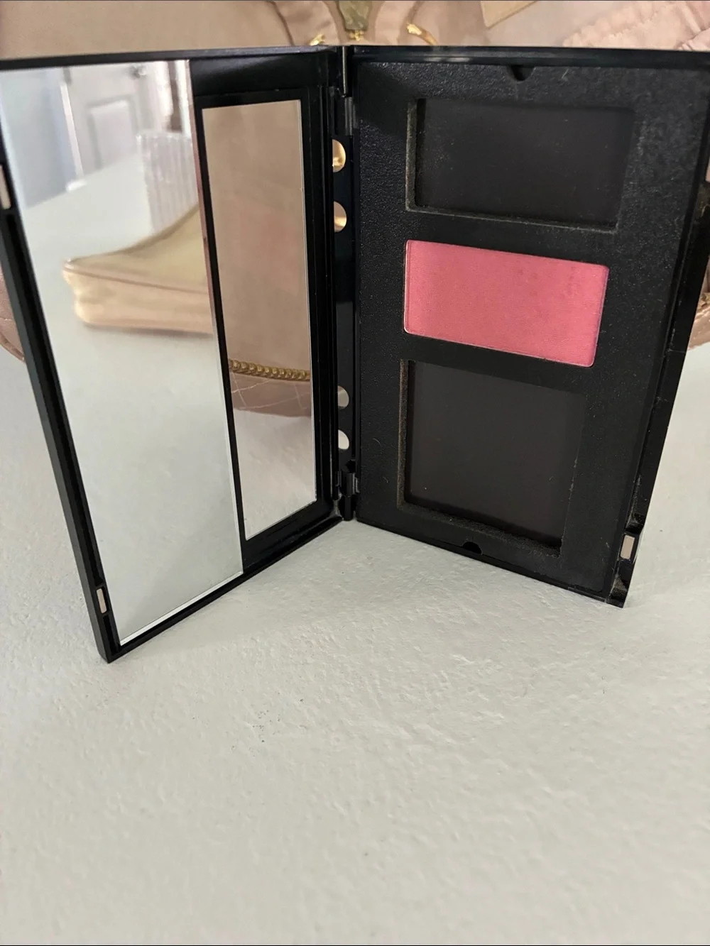 Trish McEvoy compact quilted